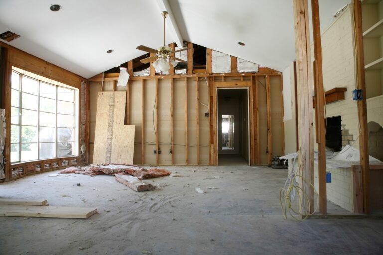 Room of a house under renovation with open wall framing
